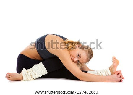 woman practices yoga on a white background, isolated.
