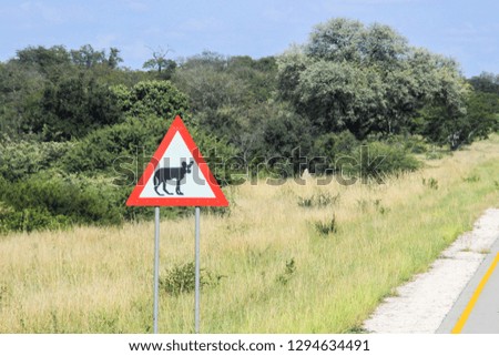 African road sign depicting an animal - a hyena on the road of Namibia