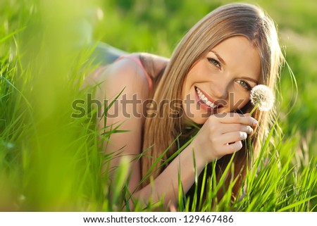 woman with dandelion