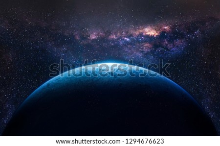 Planet in space against a nebula