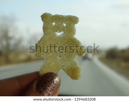 Eating Tebby Bear Potato Chips while traveling in a Car