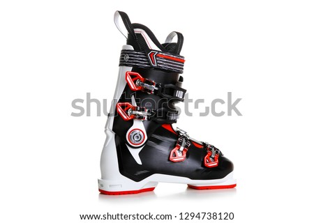 Profesional Red ski boots isolated on white background.