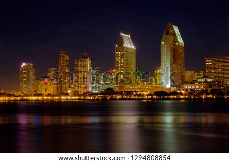 HDR image of a partial skyline of San Diego, California viewed from the water after sunset