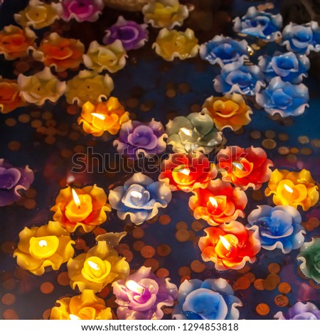 Closeup colorful floating candle rite traditional in Thailand