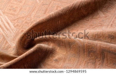 Picture. Texture, background. brown tapestry. From Santee Print Works, this cotton fabric is perfect for quilting accents, your design, décor. Colors include shades of tan and white.