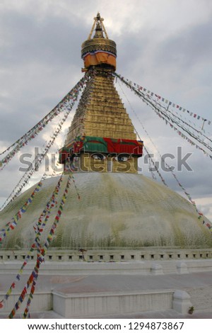 Bodnath stupa against the clouds in Nepal, Katmandu
