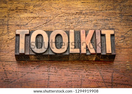 toolkit - word abstract in vintage letterpress wood type against grained wooden background Royalty-Free Stock Photo #1294919908
