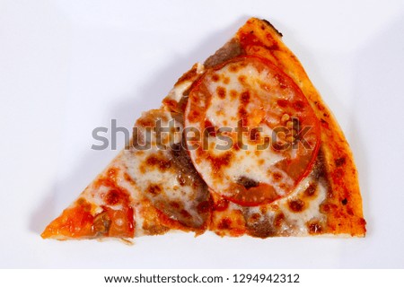 Pizza with beef cheese and tomato