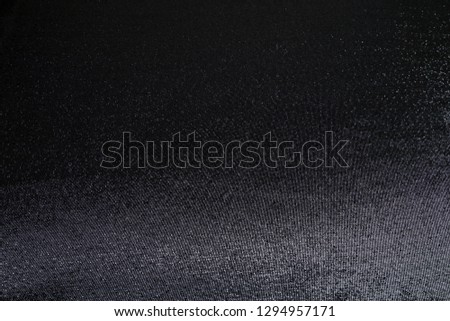 black fabric with metallic sequins, smooth brocade