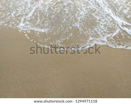 The waves of the sea on the sea shore