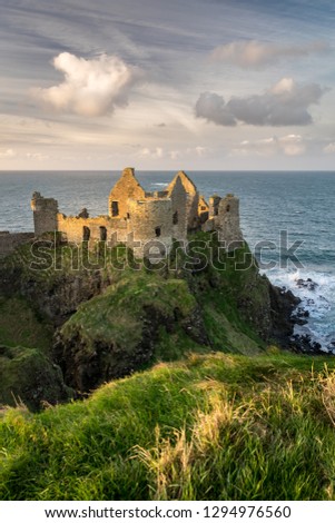 This is a picture of the ruins of Dunluce Castle in Northern Ireland.  It was built in the 13th century on the top of a sea cliff looking out to the Atlantic Ocean
