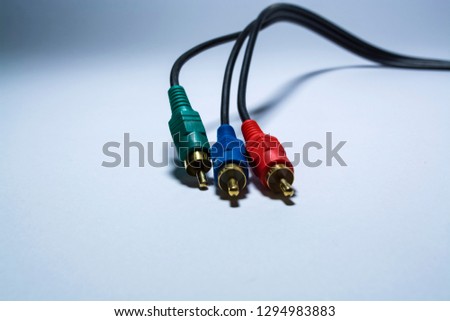 Multimedia multi-colored cables. Or tulips adapters for audiodevices. On a white background. The isolated object. 