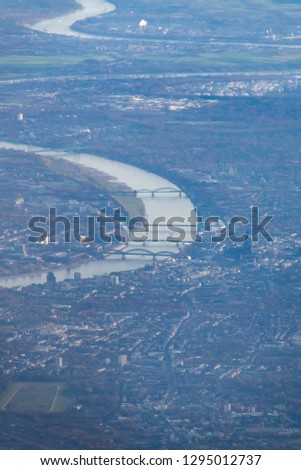 City of Cologne seen from airplane with the river Rhine and dome