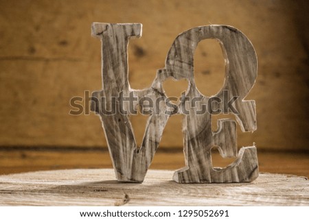  Word love in wood type, love concept. Vintage style