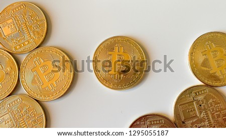 Golden bitcoins on the white background. Bitcoin is a convenient payment in a global economy market. Virtual digital currency and financial investment trade concept. Blockchain transfers concept.