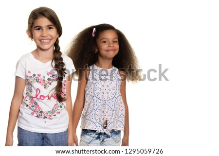 Hispanic and african american small girls  - Isolated on white