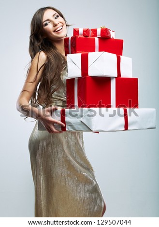 Young woman portrait hold gift in christmas color style . Smiling happy girl on white background.