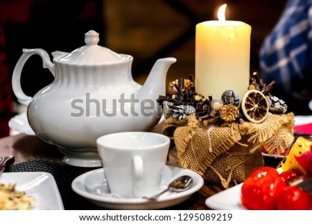 Festive table setting with candles, candlelight dinner