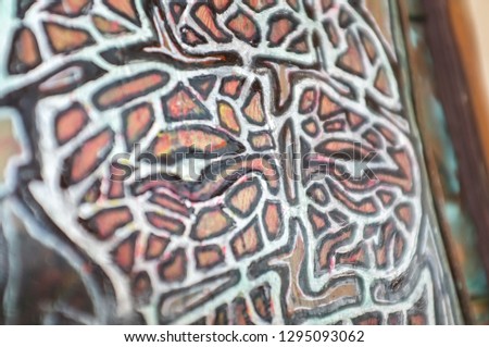 abstract picture of a man's eyes contour spotted wood pattern