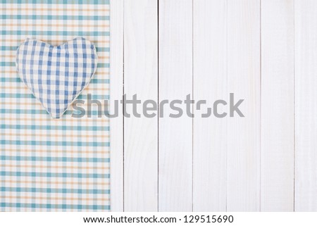 Tablecloth textile texture on wooden table background