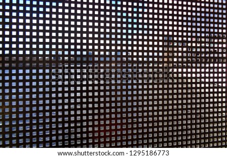 view of the city through the lattice of the fence of the bridge, London