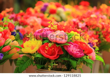 Bouquet flowers on colorful flowers background