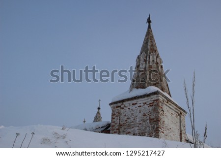 Old corner tower on the monastery wall in snowy cold winter day in Suzdal