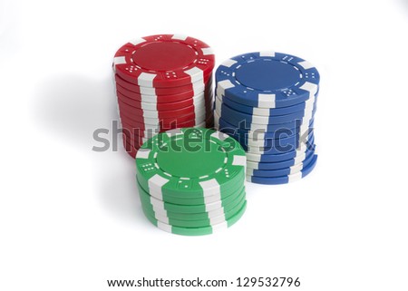  Three macro stacks of colorful gaming chips