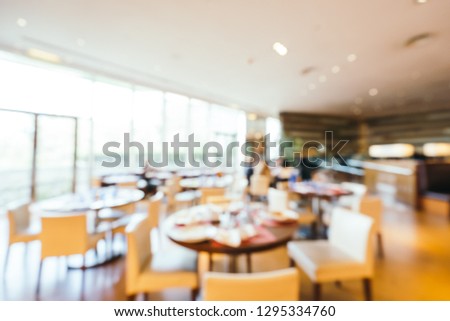 Abstract blur and defocused breakfast buffet in hotel restaurant and coffee shop cafe interior for background
