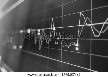 Stock exchange market in black and white on LED screen. Finance and economic concept. 