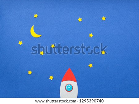 The launch into space. Flying rocket through the clouds. Start up of the space rocket. Rocket ship in flat design on blue background. 3d paper illustration. Concept of business launch. Paper cut.