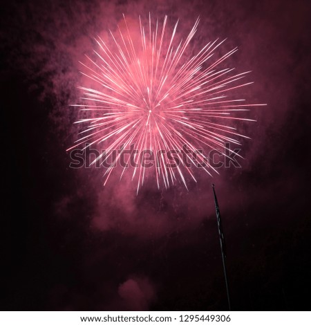 Red and Pink Fireworks With American Flag