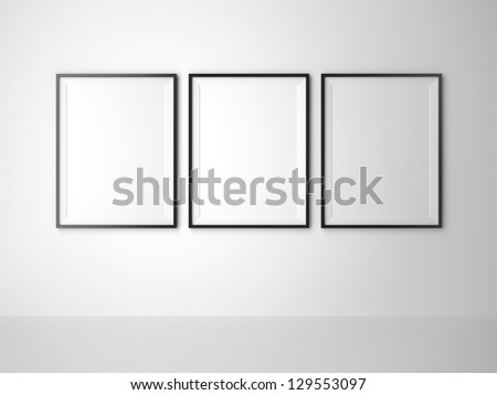 three blank frame on white wall Royalty-Free Stock Photo #129553097