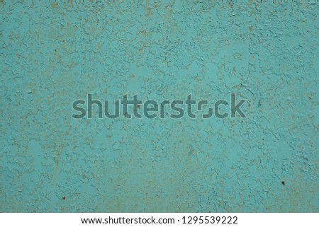 The iron sheet covered by old blue paint. Abstract background