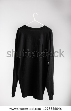 Front and back of long sleeve black t-shirt 