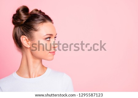 Close-up profile side view of nice lovely cute winsome attractive groomed candid calm girl looking aside copy empty blank space place isolated over pink pastel background