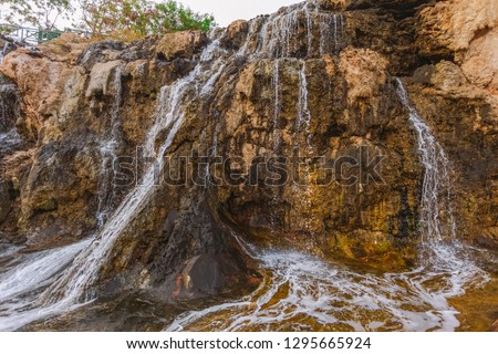 Image of waterfall in city of Antalya, Turkey. Horizontal color photography.