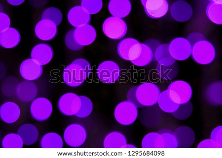 Purple bokeh, Defocused light for christmas, new year and funny holiday background.