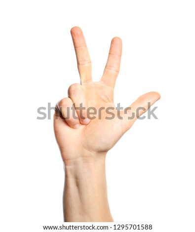 Man showing number three on white background, closeup. Sign language