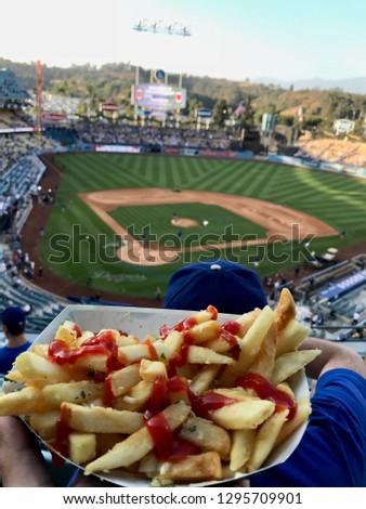 Eating fries at the ballgame
