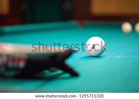 Cue hit on a billiard ball