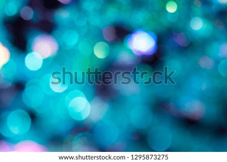 Colorful glitter abstract background with bokeh defocused lights christmas