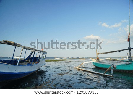 anchored boats in watudodol beach in Banyuwangi