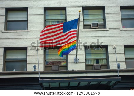 American and rainbow flags on the building