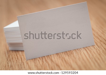 Business cards on a desk Royalty-Free Stock Photo #129593204