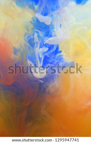 Ink blue red orange and white in water,Vector background