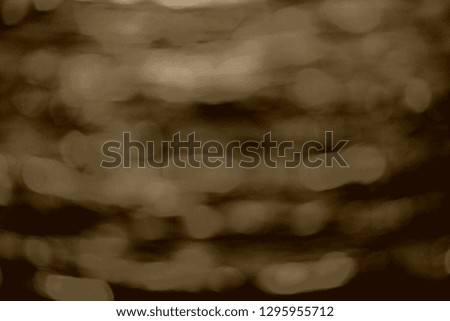 blurred vision scene of sea surface with reflection of sunlight over sea horizon at evening in minimal and close up style so impressive outdoor pattern for awesome abstract background