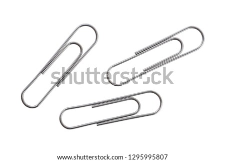 Silver paper clips isolated on white background