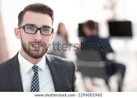 closeup.Executive businessman on background of office.