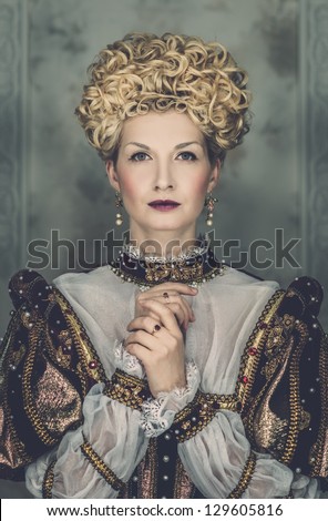 Picture of beautiful haughty queen in royal dress